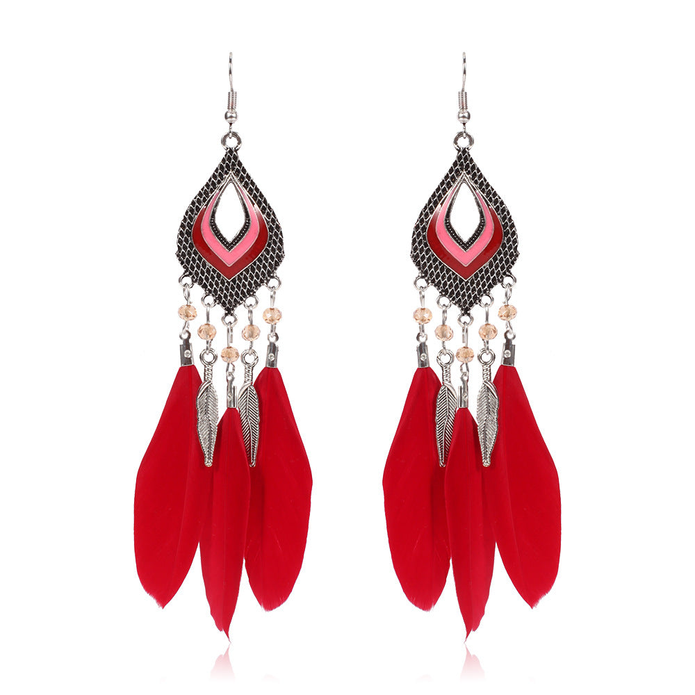 Super Fairy Seaside Holiday Feather Earrings Fan Shizu Street Shooting Long Hollow Oil Dripping Rice Bead Earrings