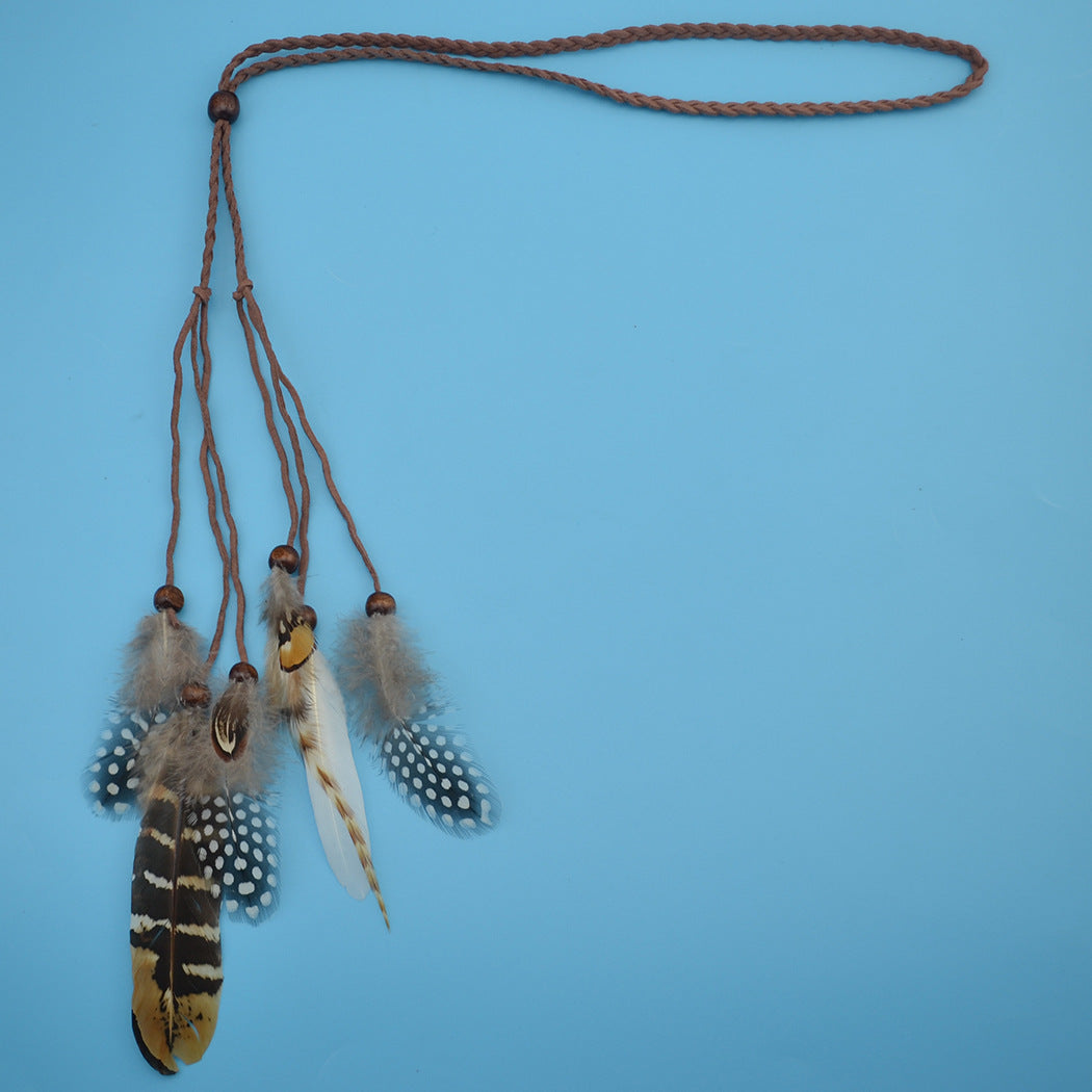 Fashionable ethnic feather hair band