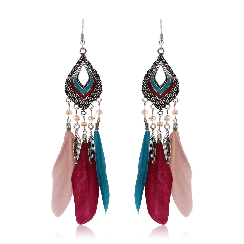 Super Fairy Seaside Holiday Feather Earrings Fan Shizu Street Shooting Long Hollow Oil Dripping Rice Bead Earrings