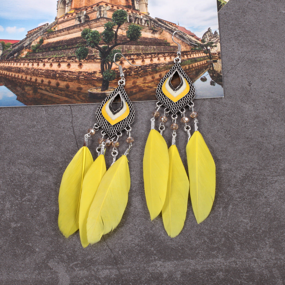 Super Fairy Seaside Holiday Feather Earrings Fan Shizu Street Shooting Long Hollow Oil Dripping Rice Bead Earrings