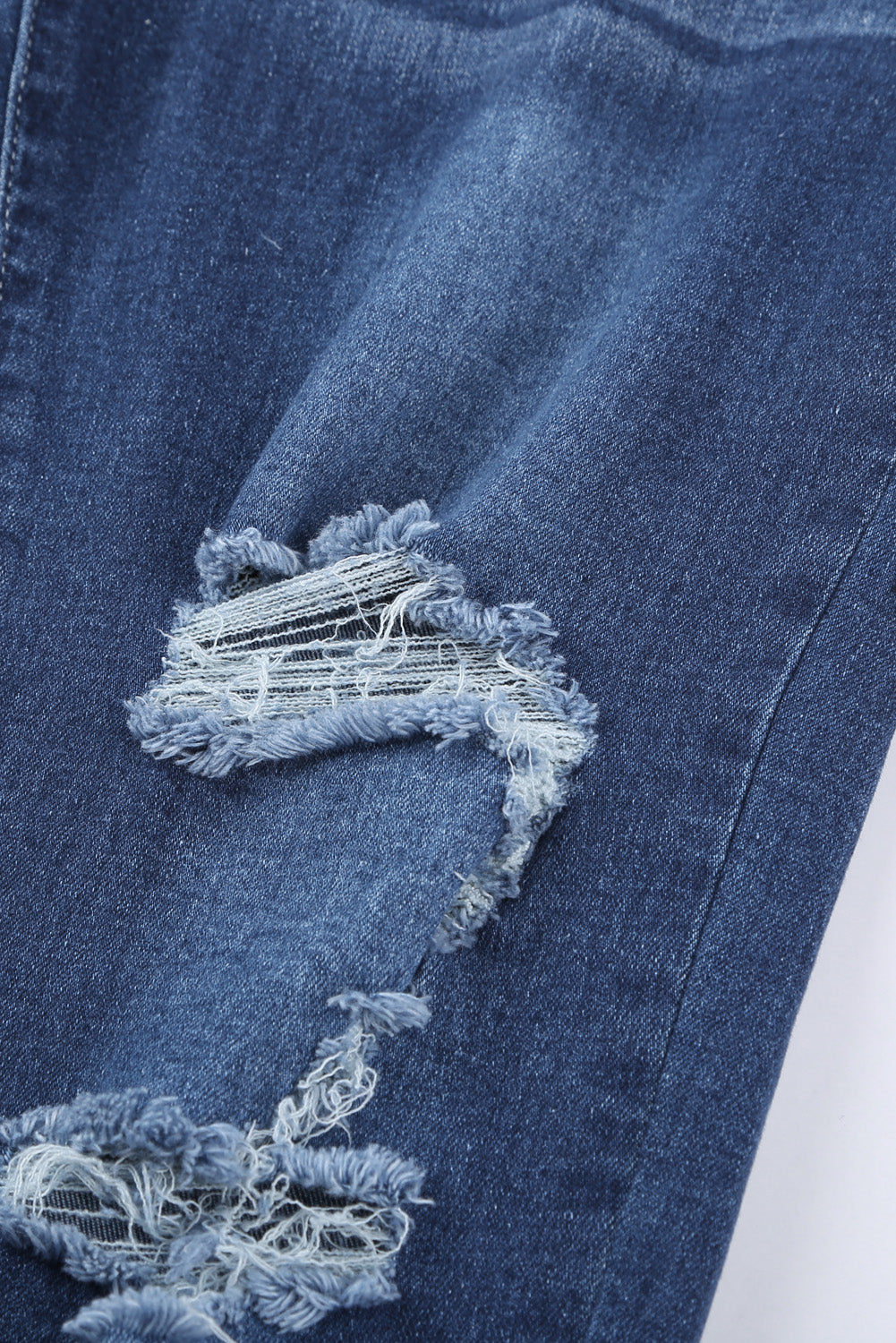 Medium Wash High Rise Distressed Skinny Jeans